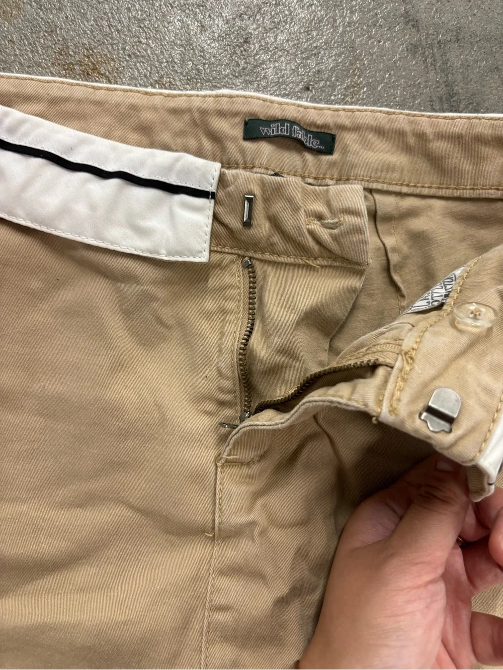 khaki skort with white trim